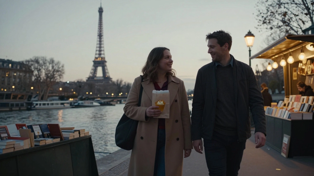 A woman and man walking along the Seine at dusk, holding crème brûlée, the Eiffel Tower glowing in the distance.